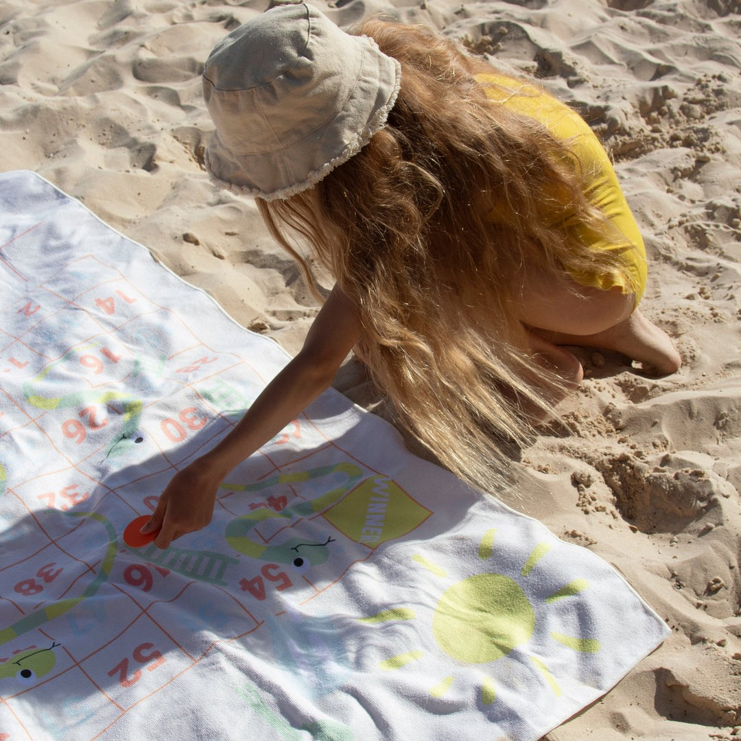 Sunnylife | Games Towel Dino Multi | Shut the Front Door